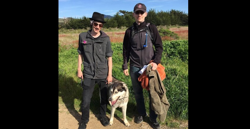 Joe Hix, left, his brother Dean Lockhead, and Lockhead's dog Fenriz on a hiking trip a few years before Hix was killed.